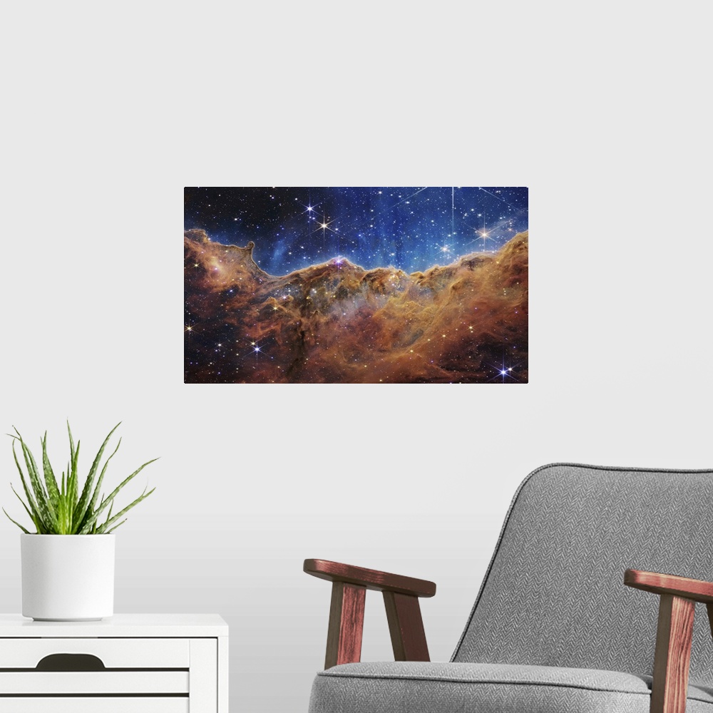 A modern room featuring A nearby, young, star-forming region NGC 3324 in the Carina Nebula. Captured in infrared light by...