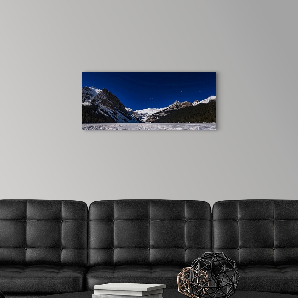 A modern room featuring Orion setting over the iconic Victoria Glacier at Lake Louise, frozen here in March, and with the...
