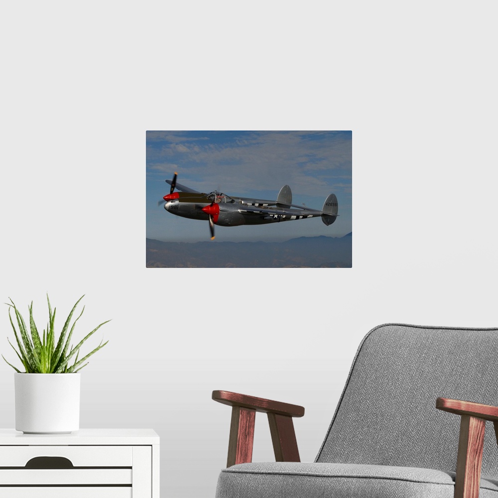 A modern room featuring P-38 Lightning flying over Santa Rosa, California.