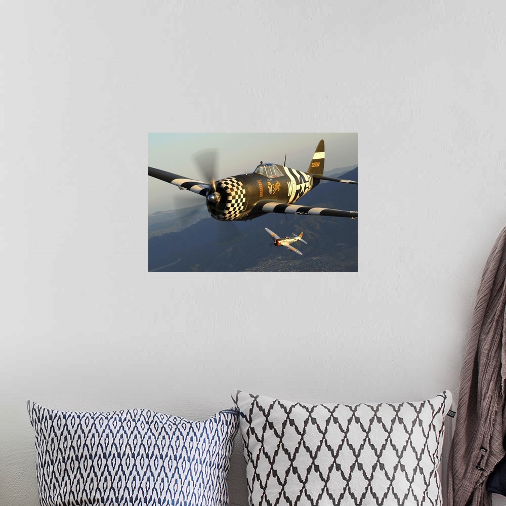 A bohemian room featuring Republic P-47 Thunderbolts flying over Chino, California.
