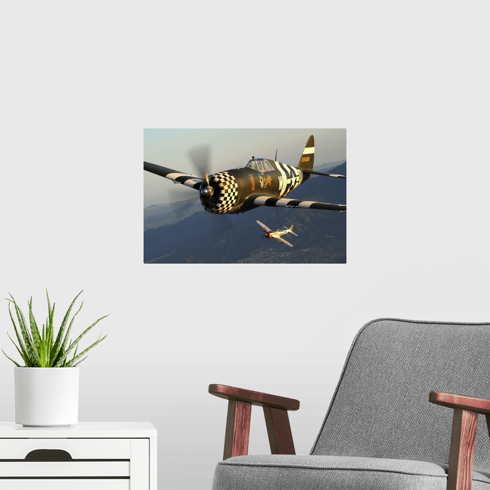 A modern room featuring Republic P-47 Thunderbolts flying over Chino, California.