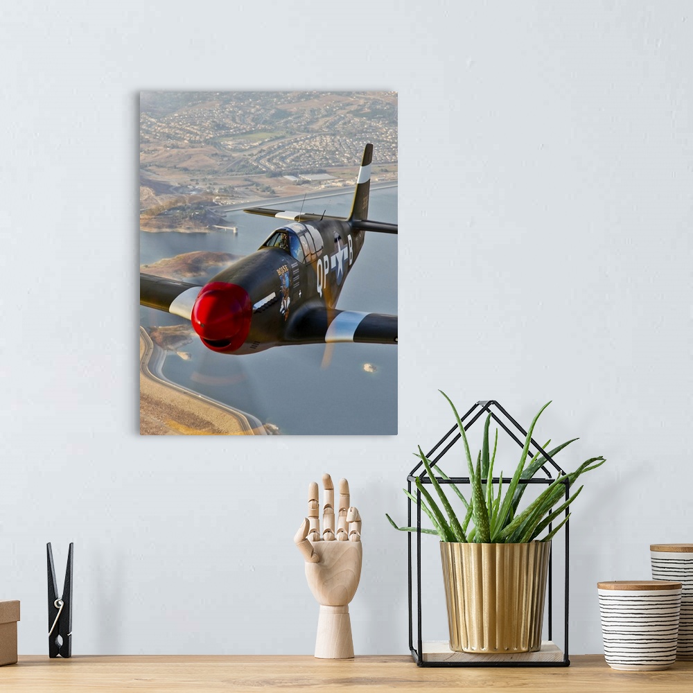 A bohemian room featuring P-51B Mustang in flight over China, California.