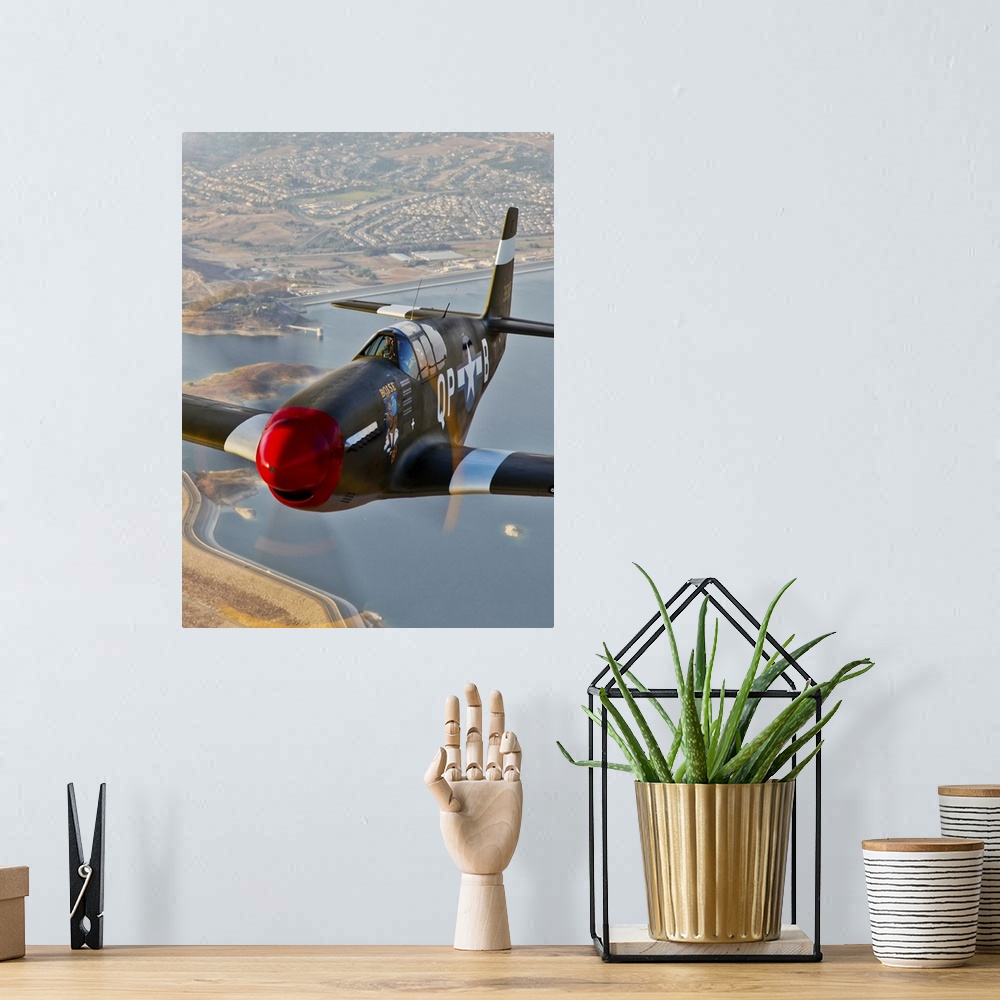 A bohemian room featuring P-51B Mustang in flight over China, California.