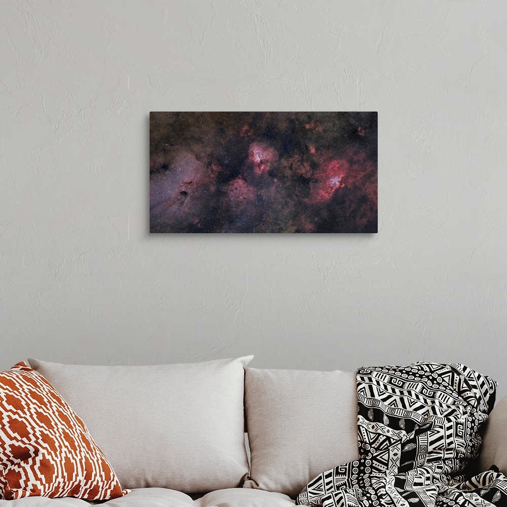 A bohemian room featuring This large field contains many famous objects including the Eagle Nebula, Swan Nebula, Lobster Ne...