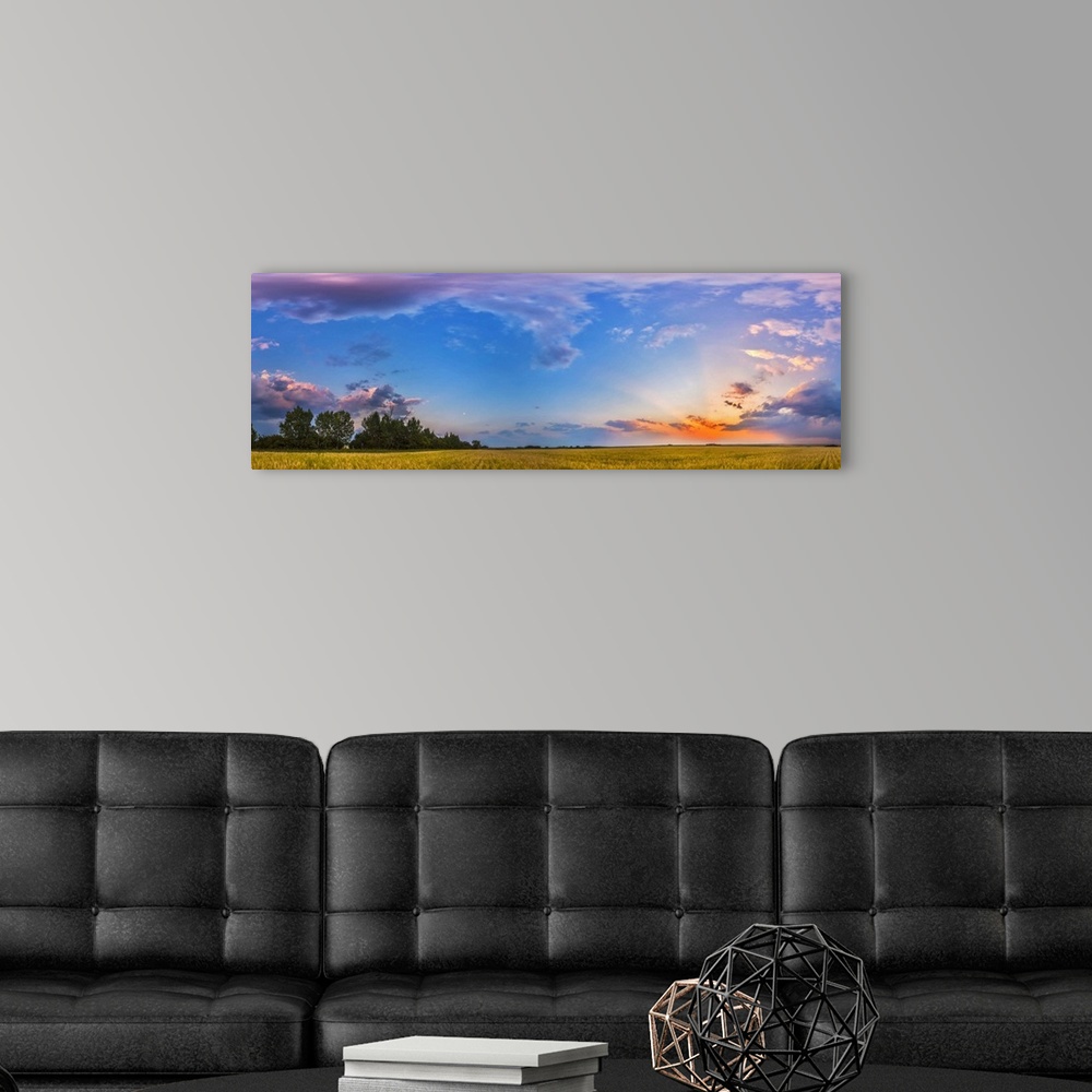 A modern room featuring August 6, 2014 - The colors of the sunset sky in a 360 degree panorama at sunset in Alberta, Cana...