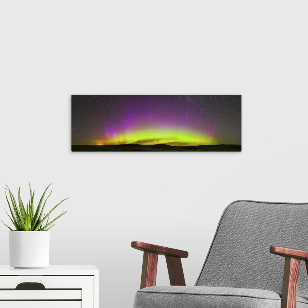 A modern room featuring July 14, 2013 - Panorama of the northern lights from the Reesor Ranch in Cypress Hills, southwest...