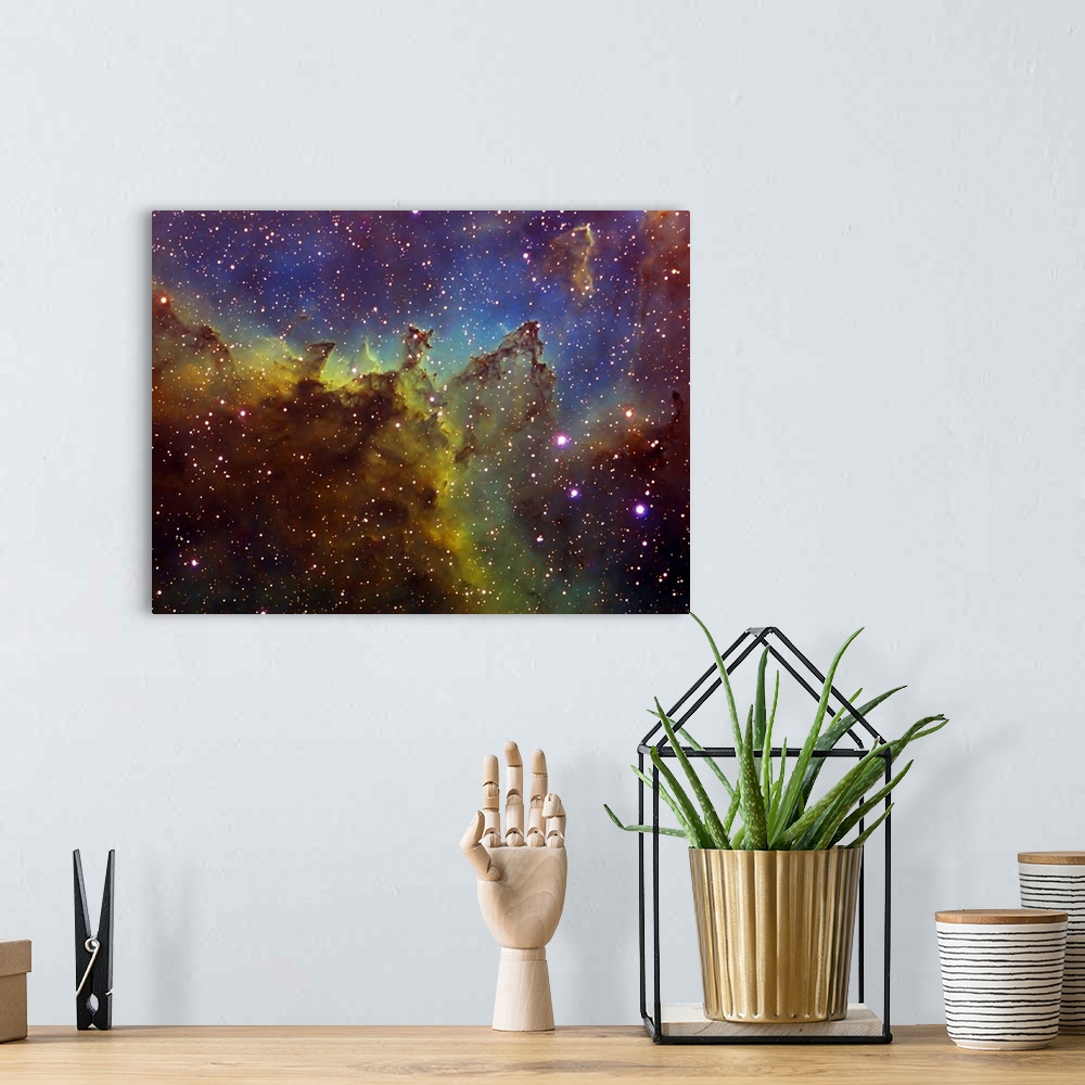 A bohemian room featuring Photograph of stars with multicolored waves of gas and clouds in the background.