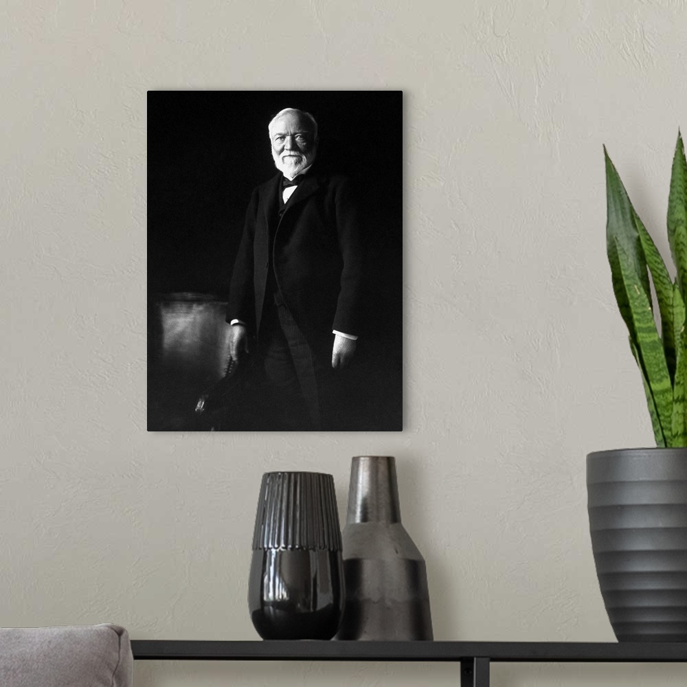 A modern room featuring Photo of industrialist Andrew Carnegie.