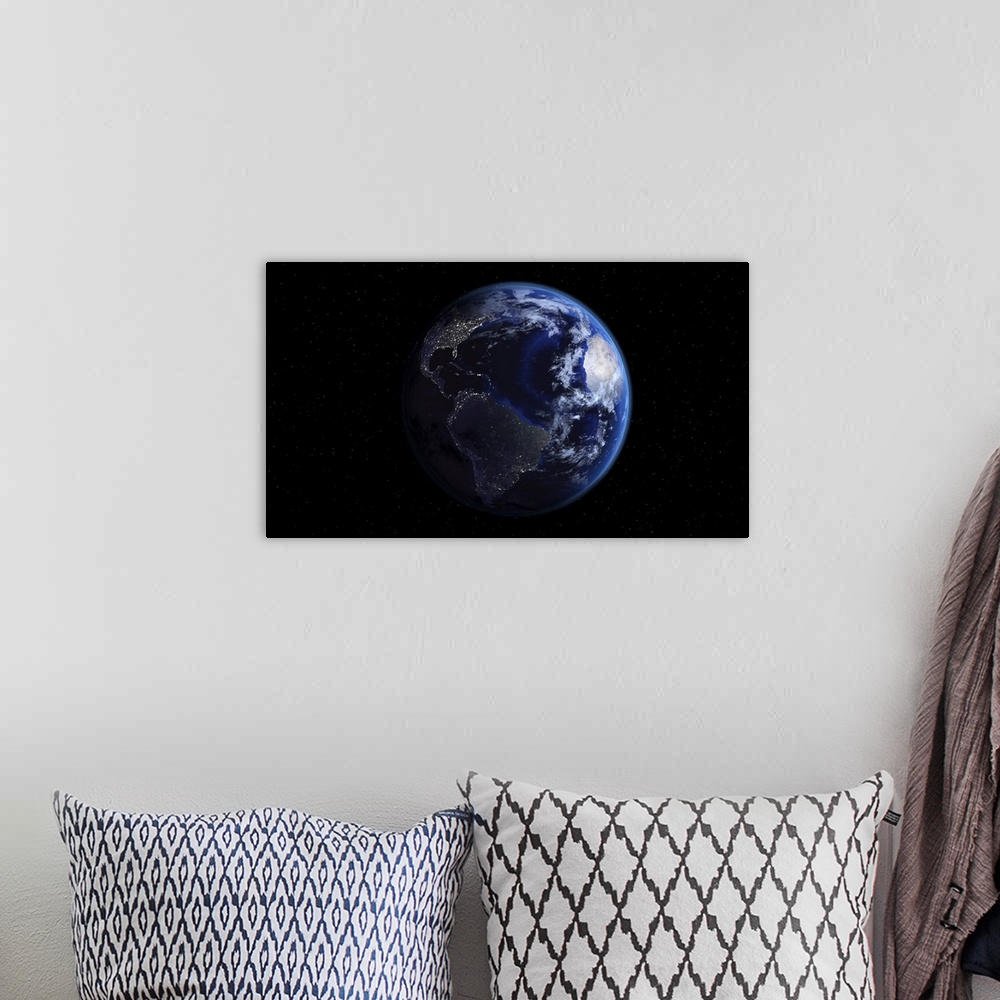 A bohemian room featuring Planet Earth showing Americas, half night and half day with city lights.
