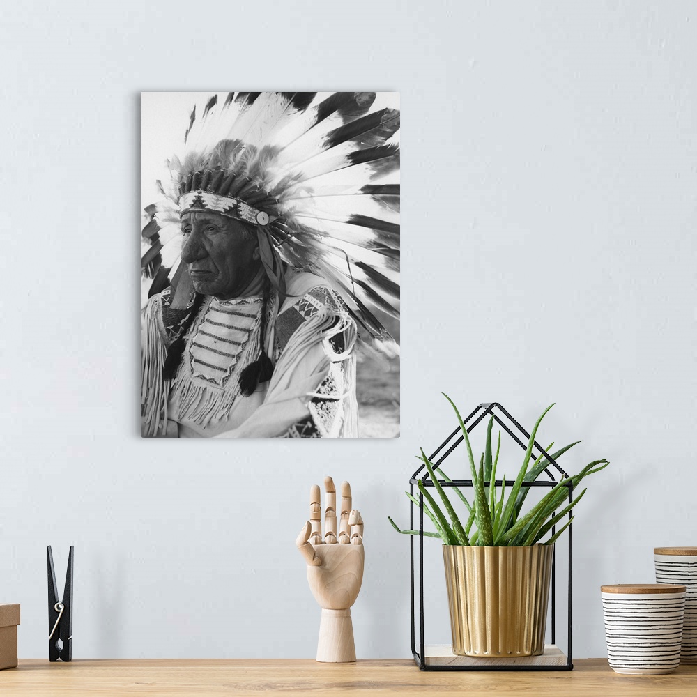 A bohemian room featuring Portrait of Chief Red Cloud in headdress.