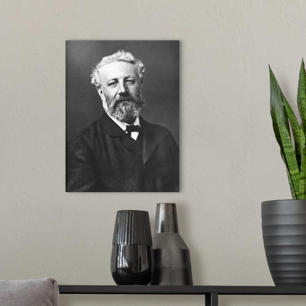 A modern room featuring Portrait of French novelist Jules Verne.