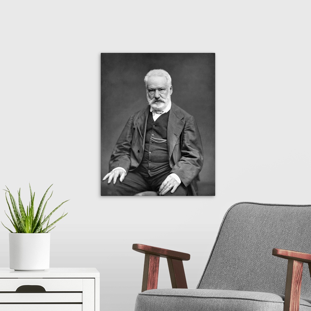 A modern room featuring Portrait of novelist Victor Hugo.