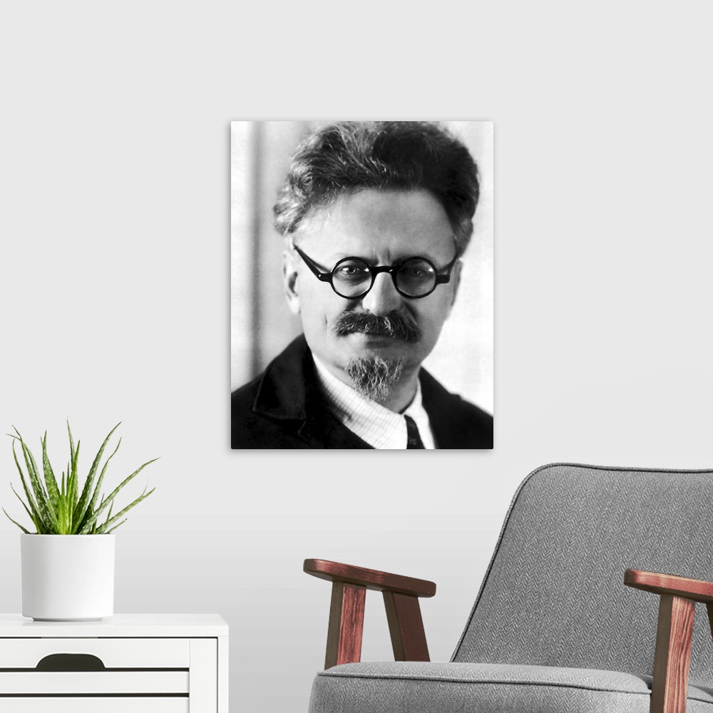 A modern room featuring Portrait of Russian Commissar Leon Trotsky.