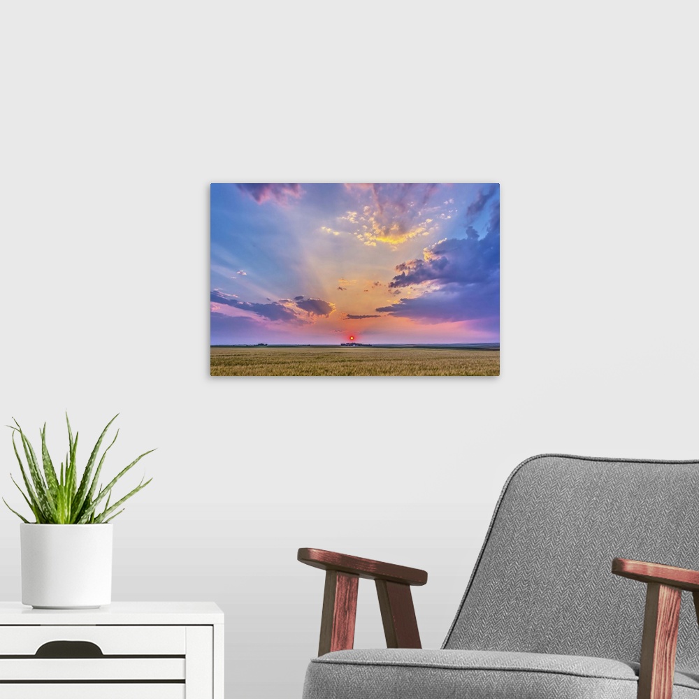 A modern room featuring August 6, 2014 - High dynamic range photo of a red setting Sun in haze, casting shadows across th...