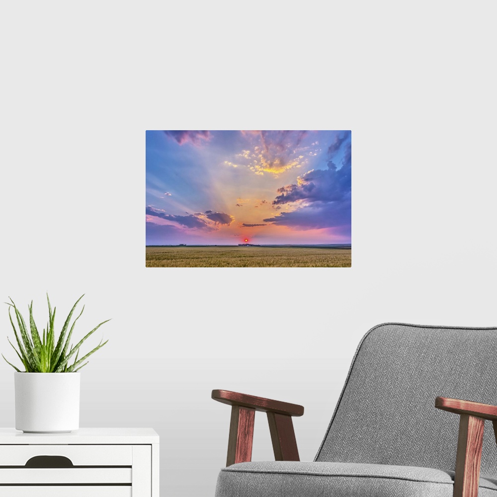 A modern room featuring August 6, 2014 - High dynamic range photo of a red setting Sun in haze, casting shadows across th...