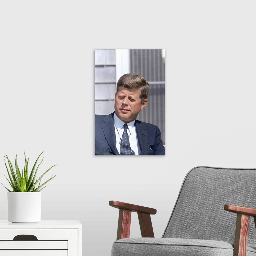 A modern room featuring Digitally restored photo of President John F. Kennedy.