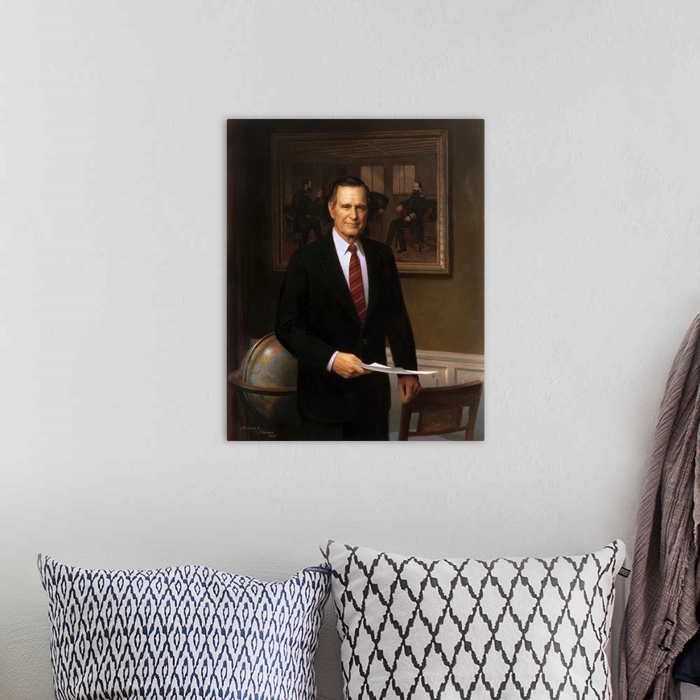 A bohemian room featuring Presidential portrait of President George H.W. Bush.