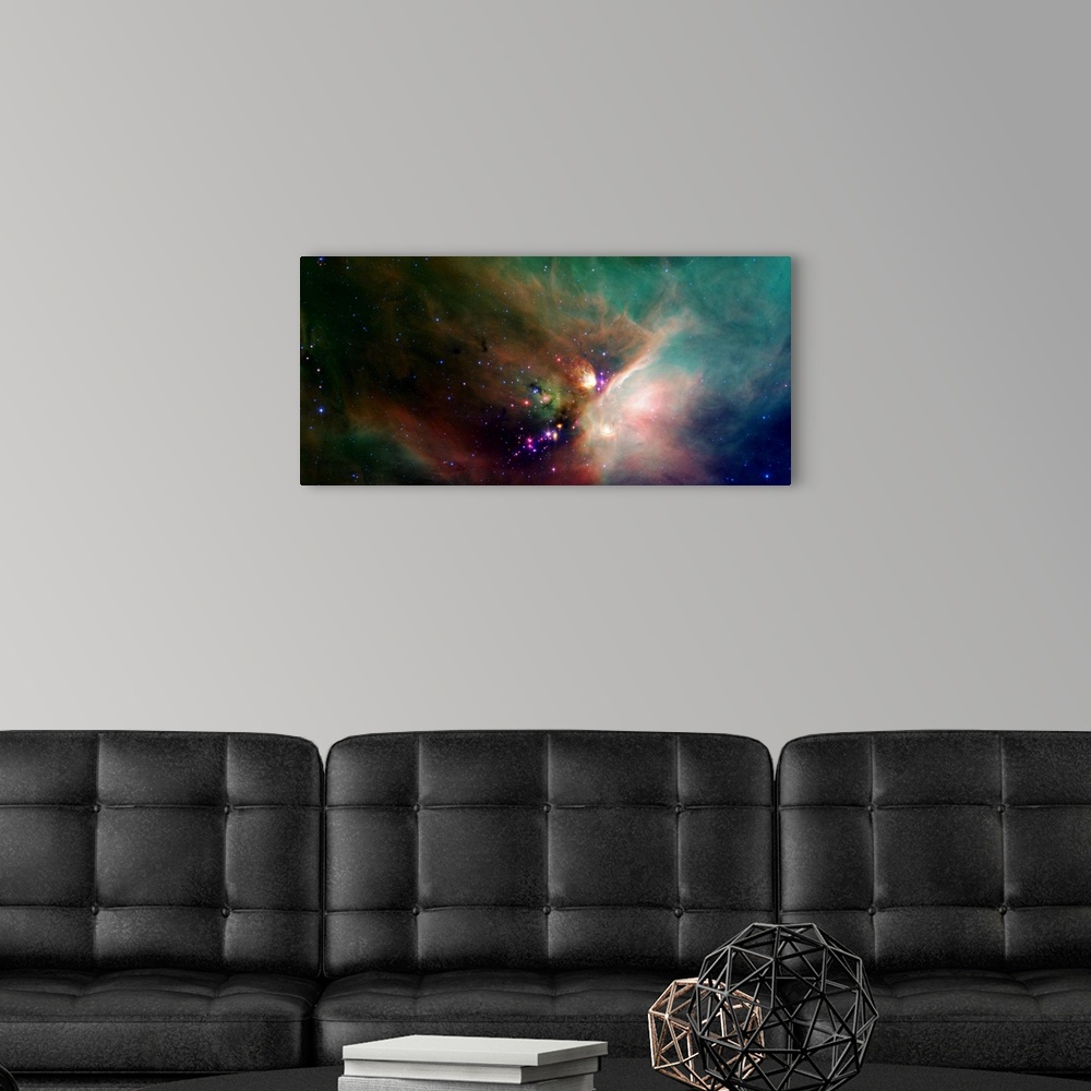 A modern room featuring Photo of a colorful nebula in space with stars all around.
