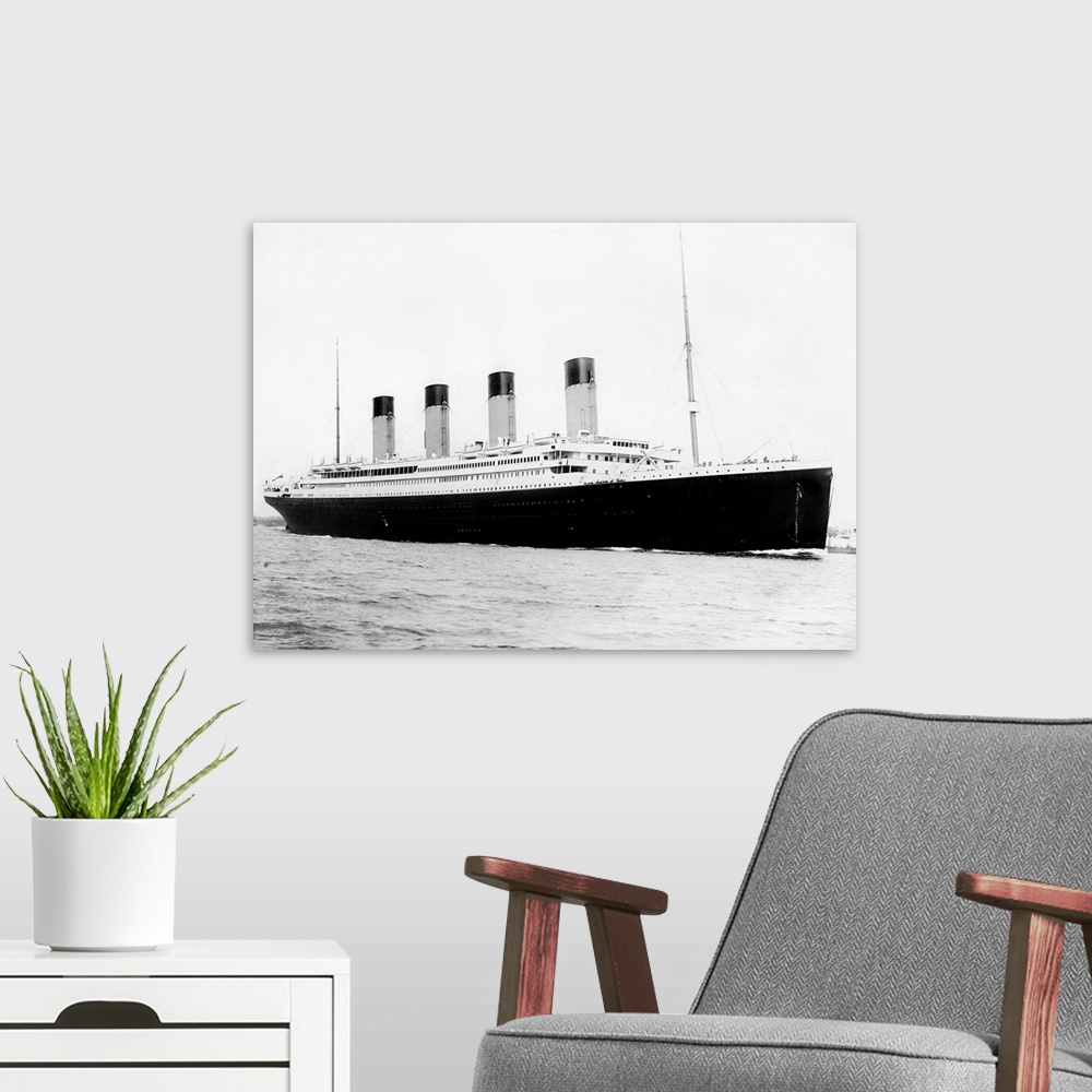 A modern room featuring Digitally restored vintage maritime history photo of the RMS Titantic departing Southampton on Ap...