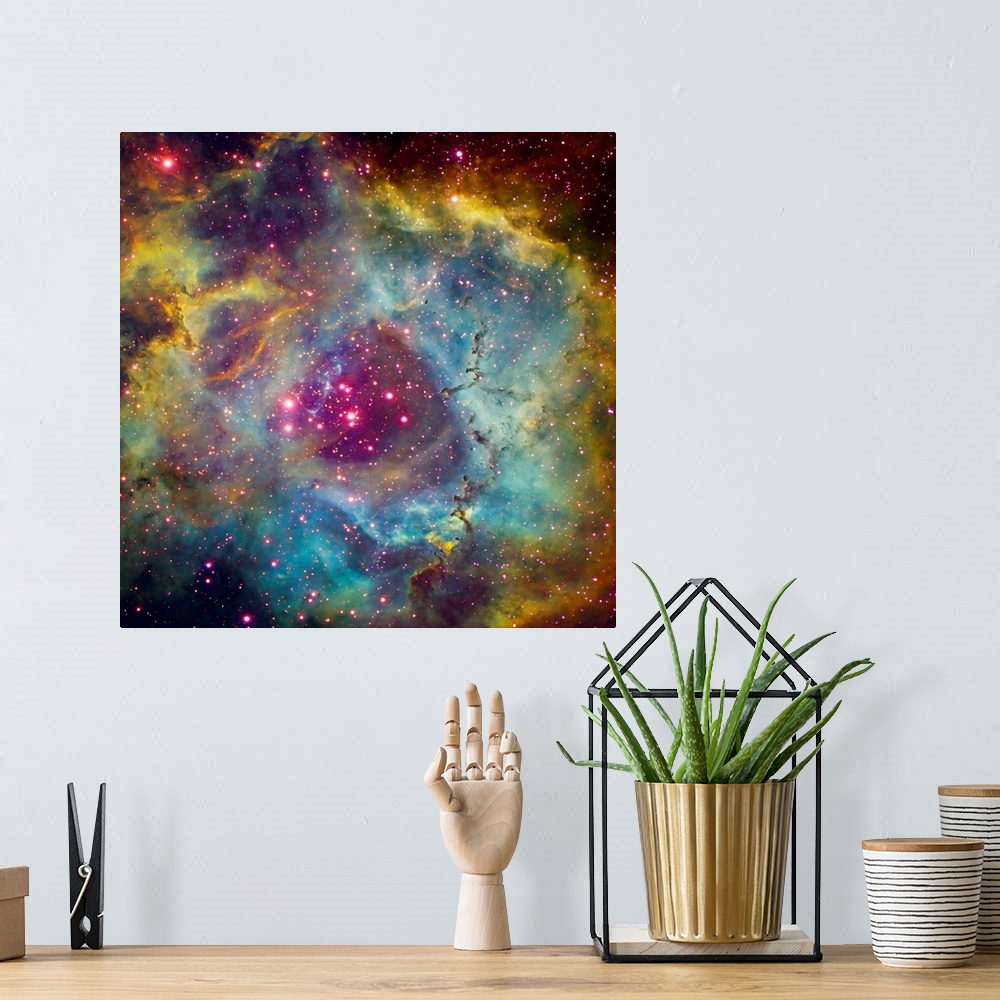 A bohemian room featuring Large square photograph taken of a star filled sky against the vibrant background of Rosette Nebu...