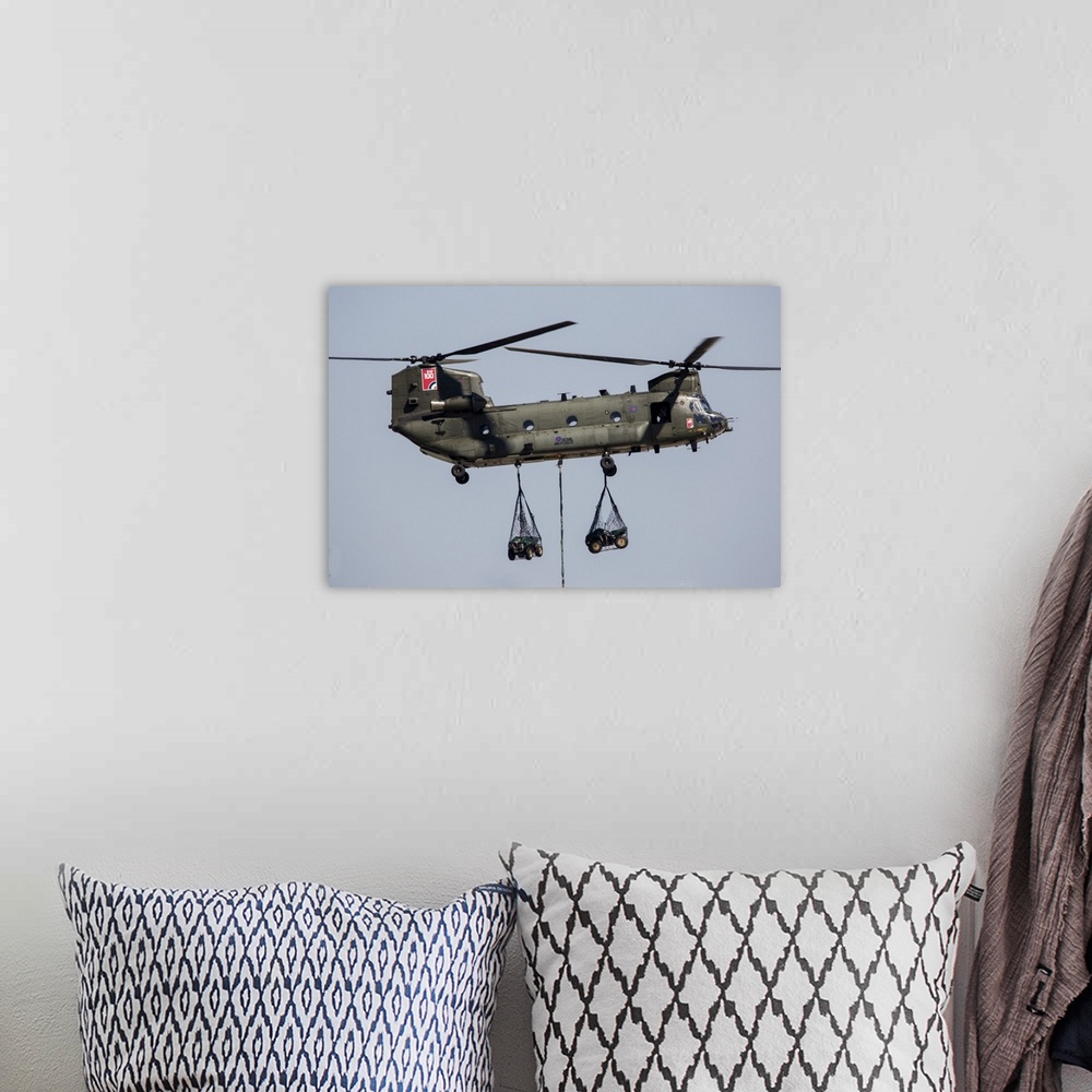 A bohemian room featuring Royal Air Force CH-47 Mk6 with sling loads and 100th anniversary markings of the Royal Air Force.