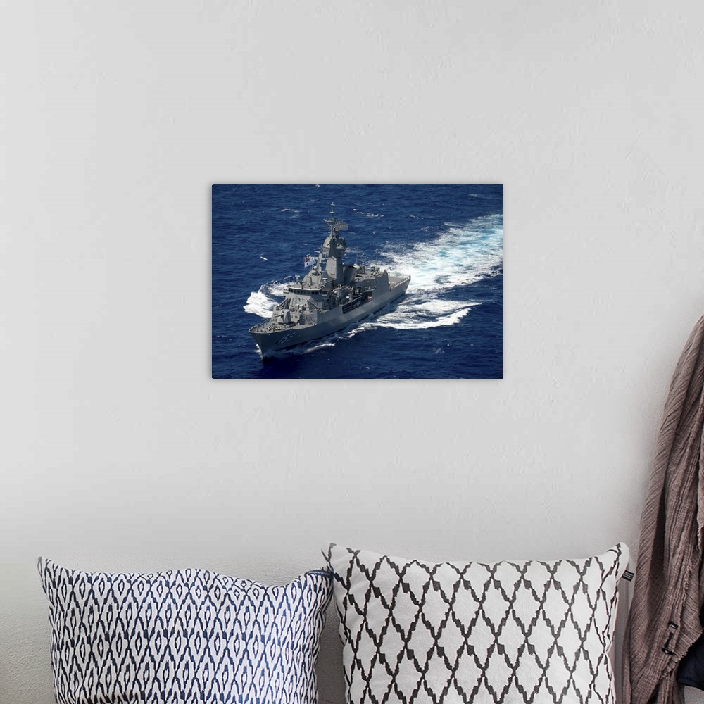 A bohemian room featuring Royal Australian Navy Anzac Class frigate HMAS Ballarat.
