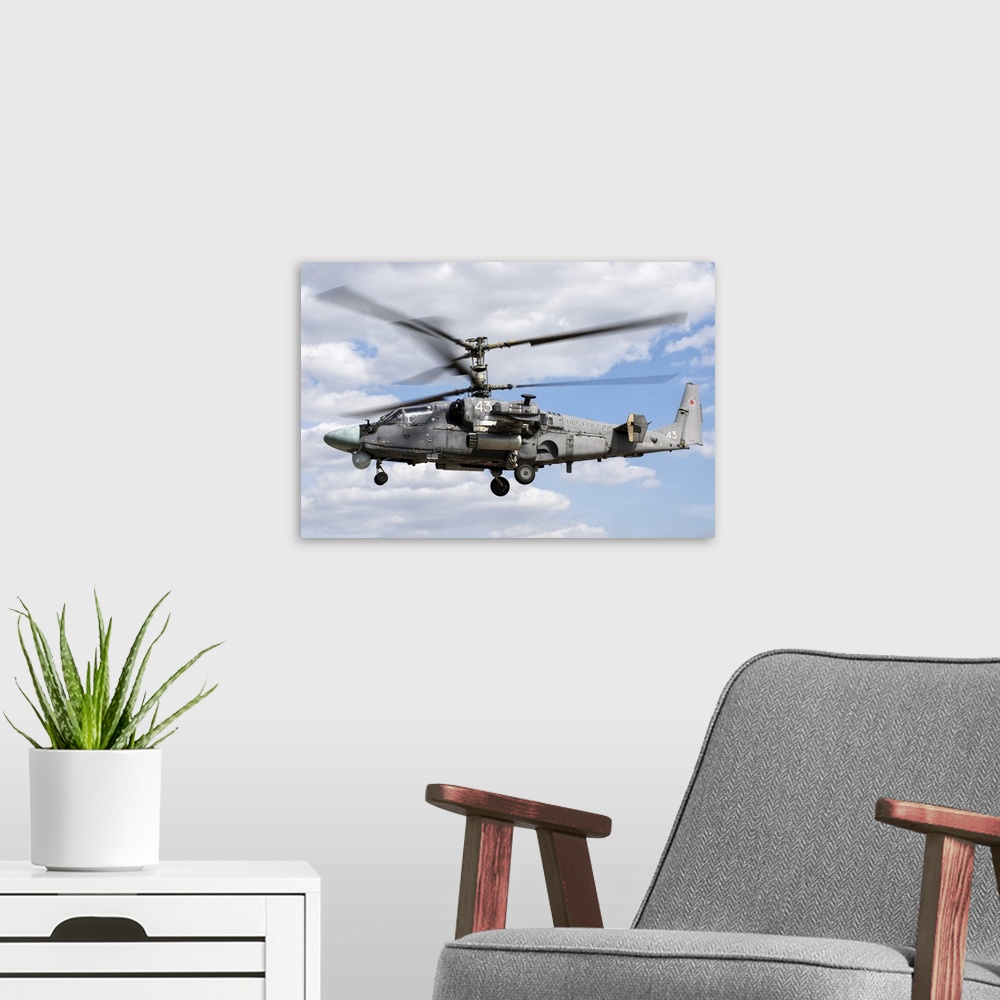 A modern room featuring Russian Aerospace Forces Ka-52 attack helicopter at the contest Aviadarts 2019 (International Arm...