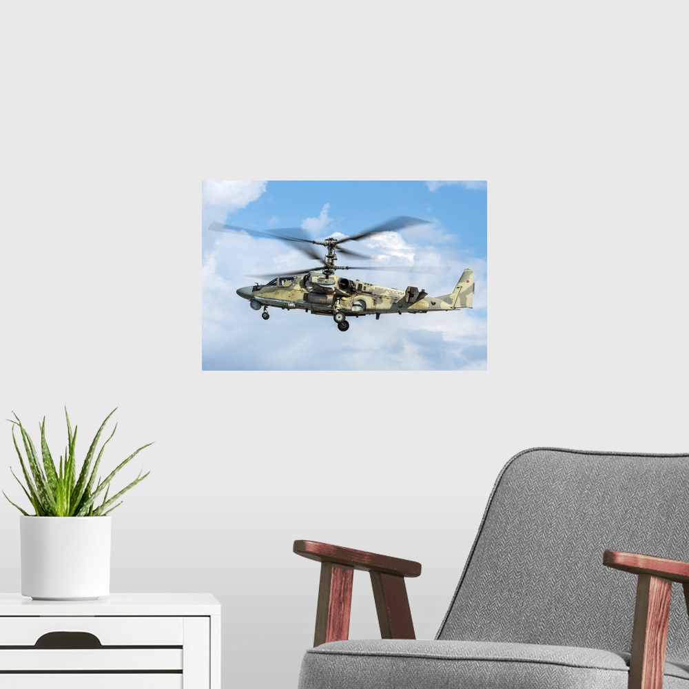 A modern room featuring Russian Aerospace Forces Ka-52 attack helicopter in flight, Russia.