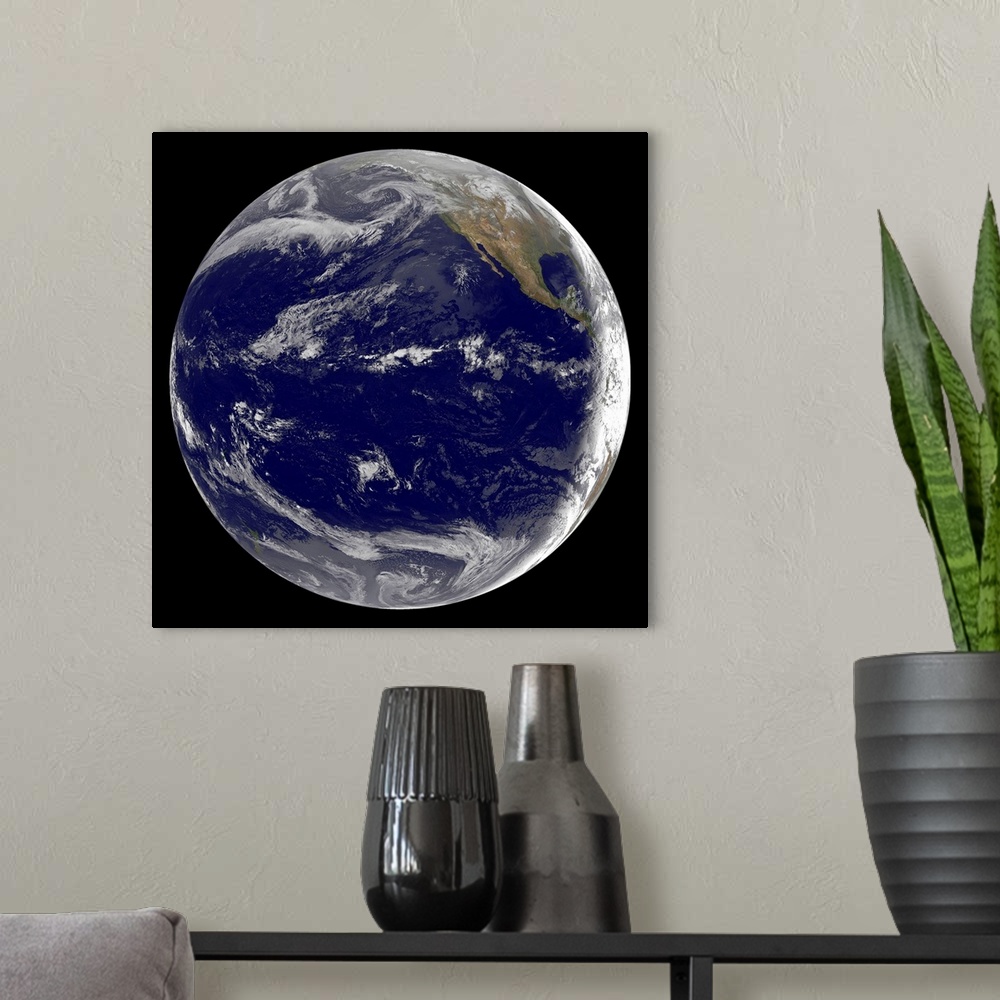A modern room featuring Satellite image of Earth over the Pacific Ocean on March 11, 2011. Waves from the powerful 8.9 Ri...