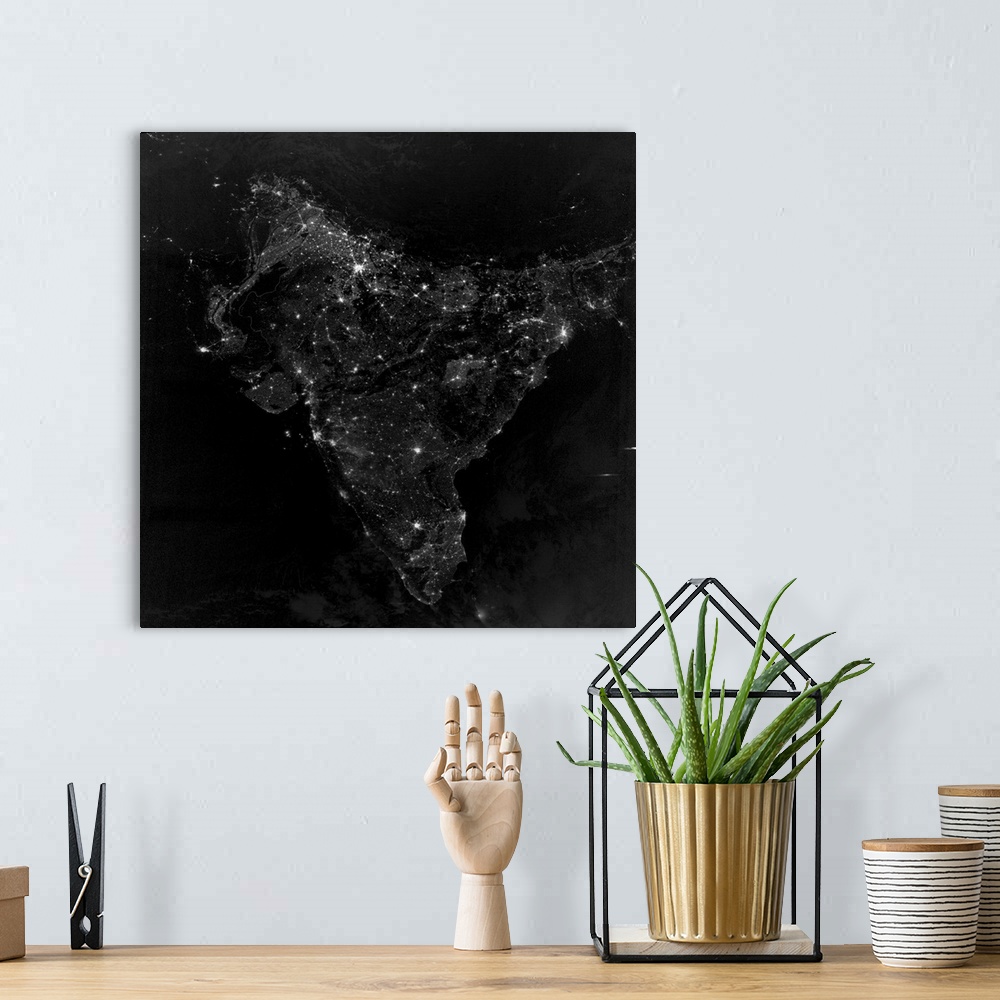 A bohemian room featuring November 12, 2012 - Satellite view of city, village, and highway lights in India.