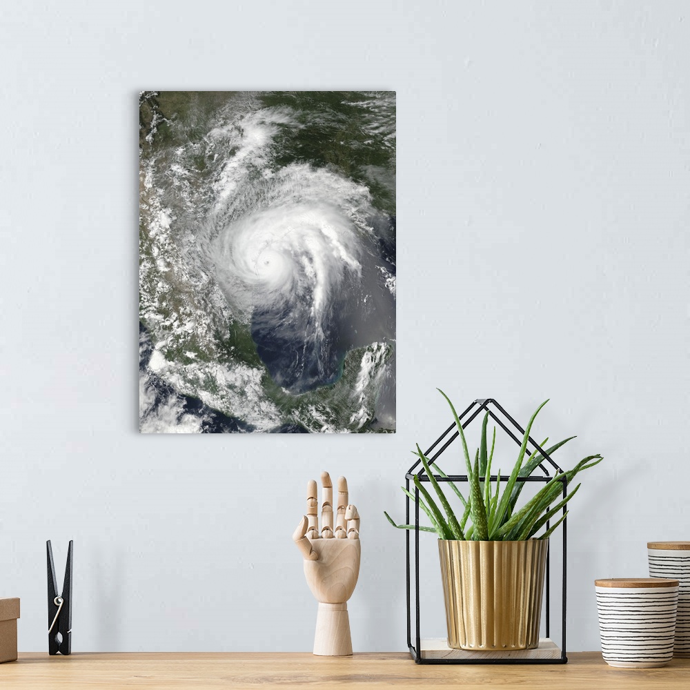 A bohemian room featuring Satellite view of Hurricane Harvey over Texas.