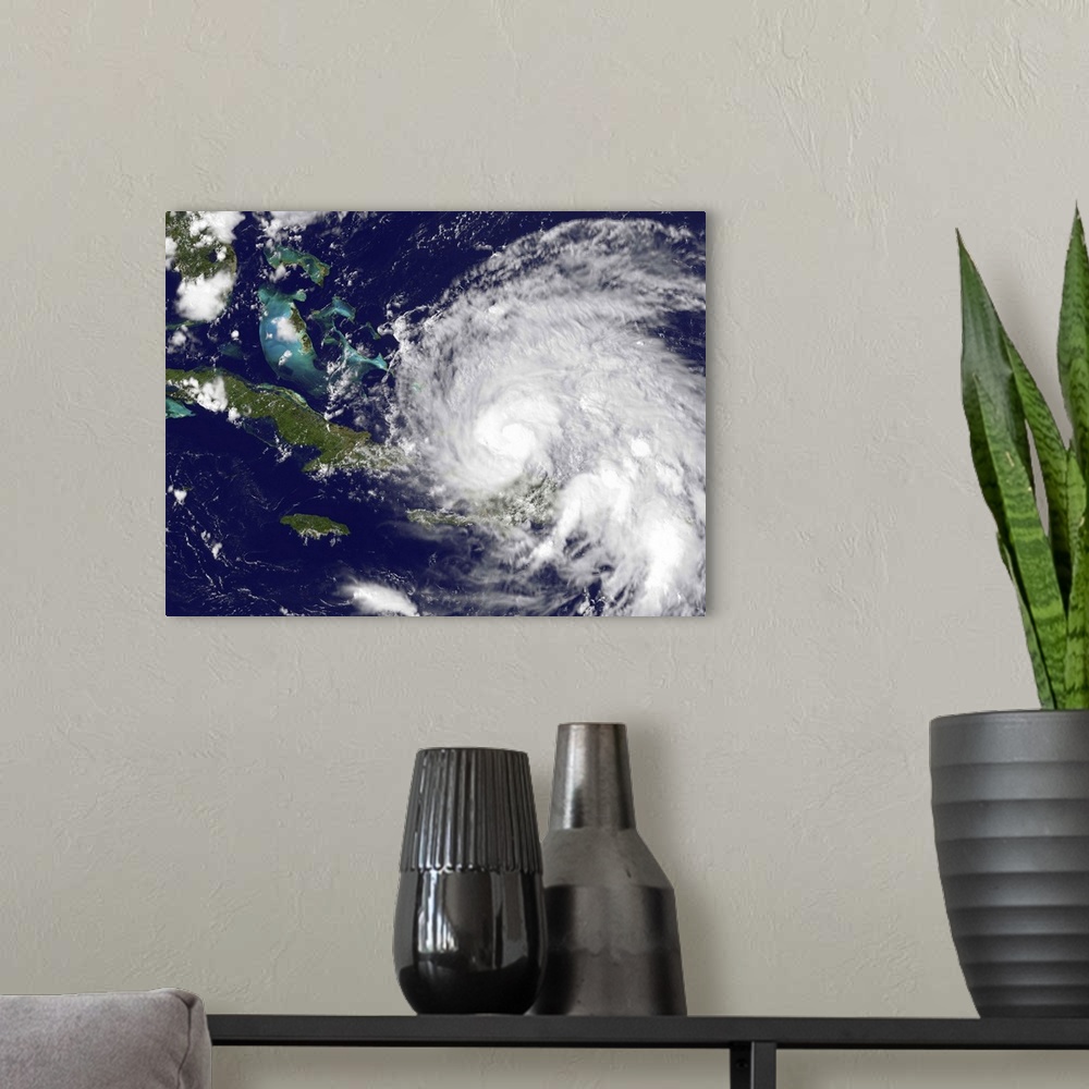 A modern room featuring August 23, 2011 - Satellite view of Hurricane Irene approaching the Bahamas. No eye is visible in...