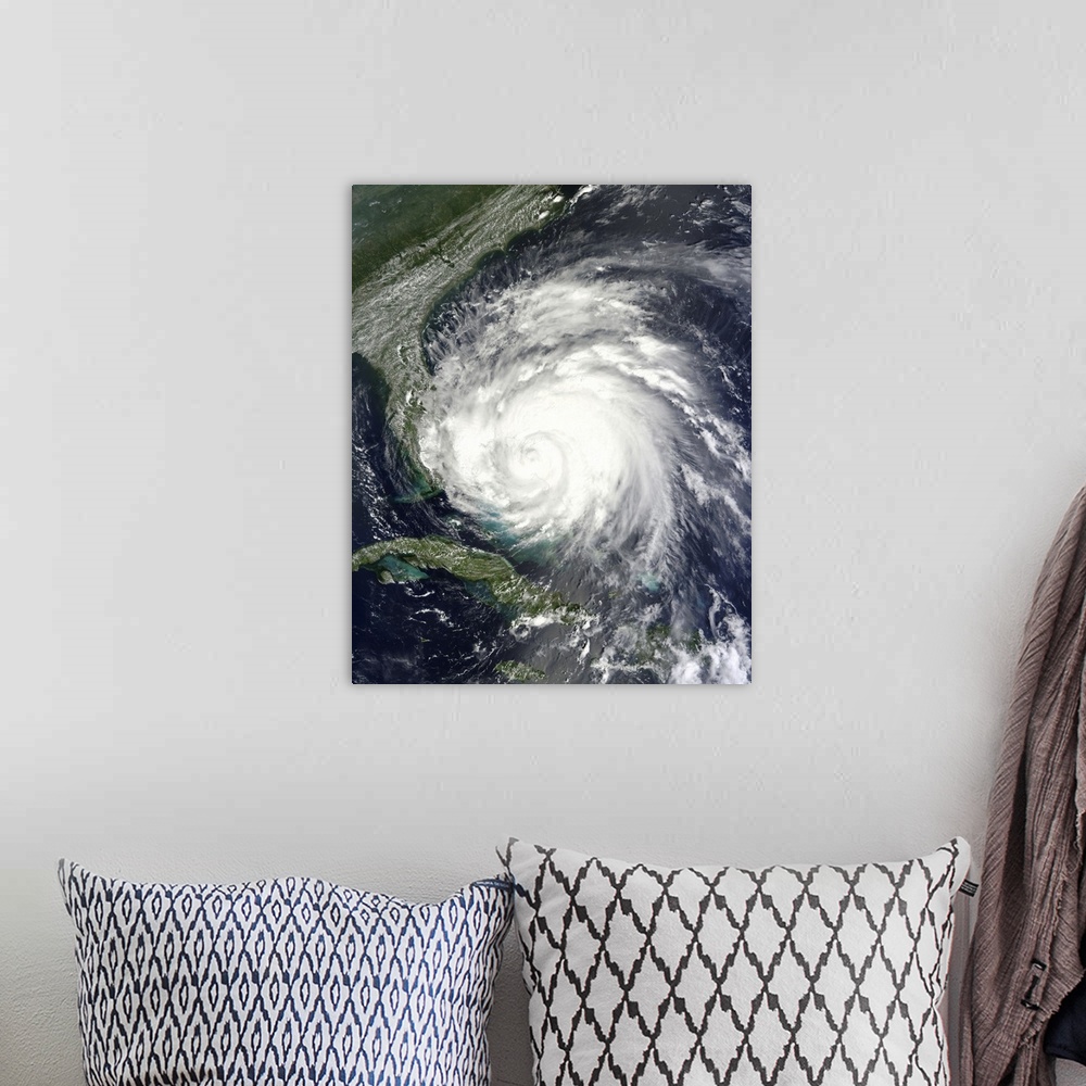 A bohemian room featuring August 25, 2011 - Satellite view of Hurricane Irene over the Bahamas.