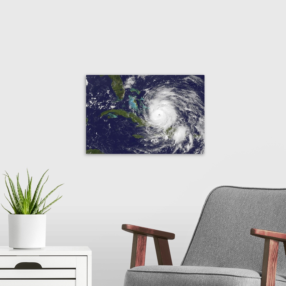 A modern room featuring August 24, 2011 - Satellite view of the eye of Hurricane Irene as it enters the Bahamas.