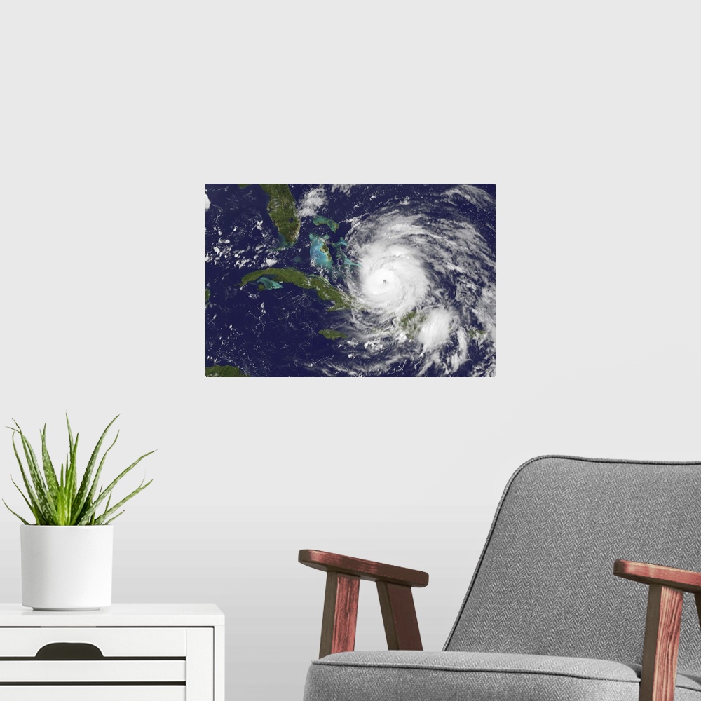 A modern room featuring August 24, 2011 - Satellite view of the eye of Hurricane Irene as it enters the Bahamas.