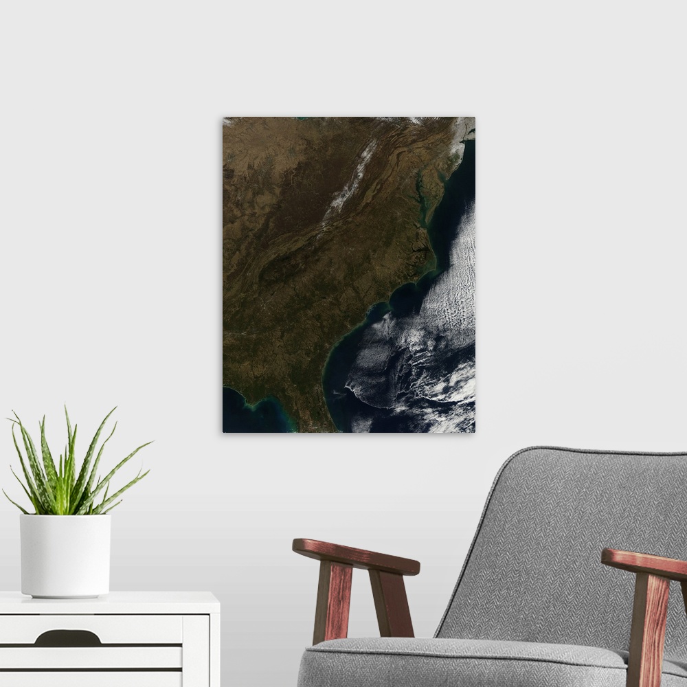 A modern room featuring January 3, 2011 - Satellite view of the Southeastern United States. In the northeast corner of th...