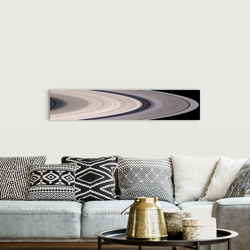 A bohemian room featuring Long panoramic image of the rings of Saturn in concentric circles.