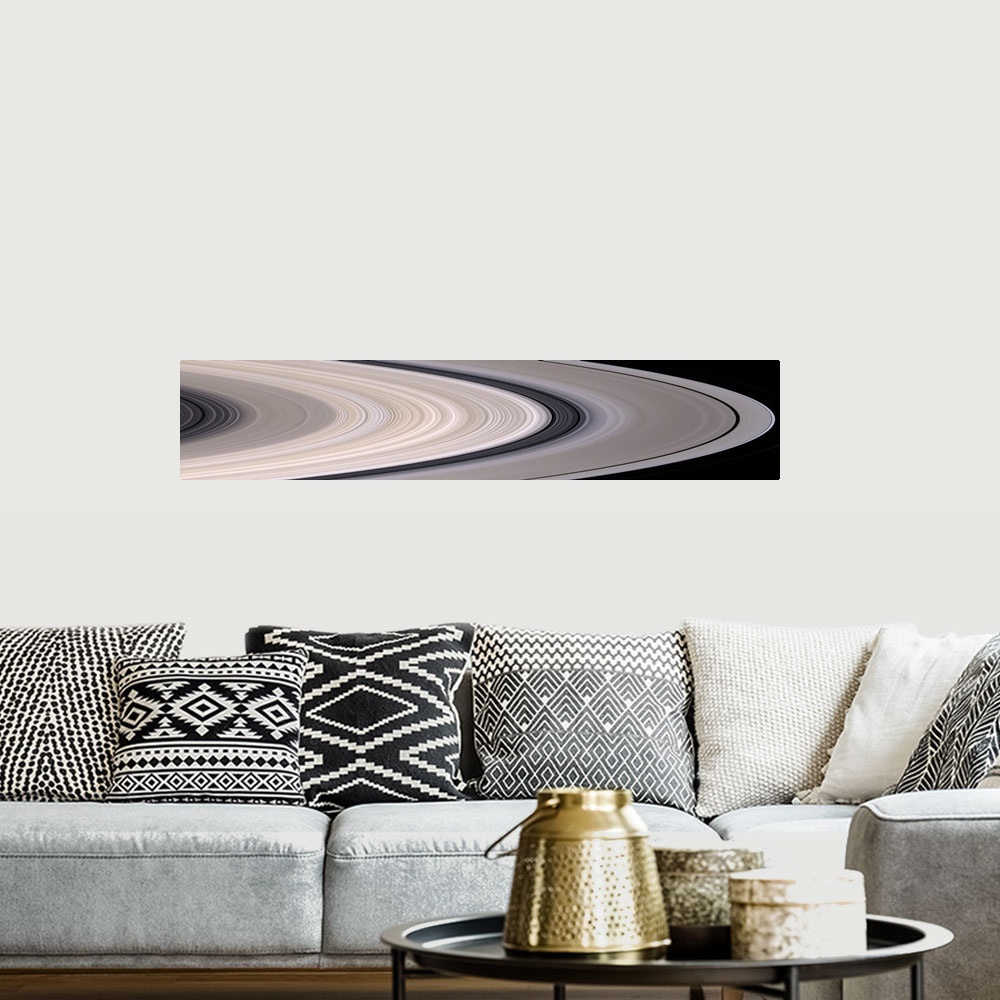 A bohemian room featuring Long panoramic image of the rings of Saturn in concentric circles.
