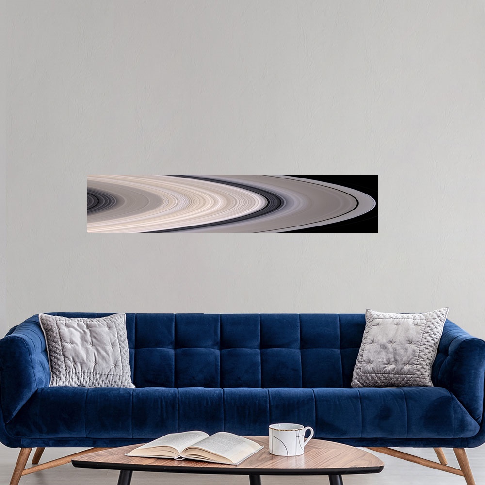 A modern room featuring Long panoramic image of the rings of Saturn in concentric circles.