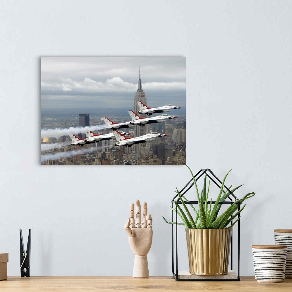 A bohemian room featuring Photo of six US Air Force Thunderbirds flying in V formation high above New York City with the Em...