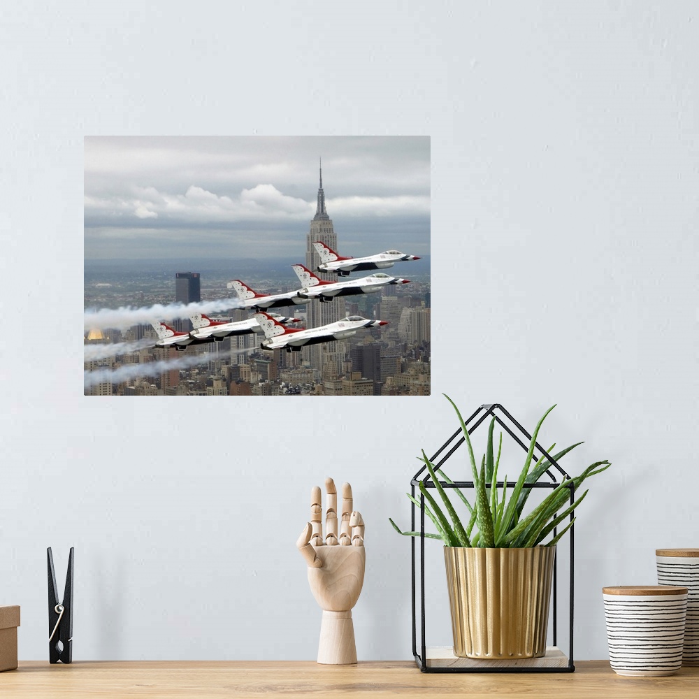 A bohemian room featuring Photo of six US Air Force Thunderbirds flying in V formation high above New York City with the Em...