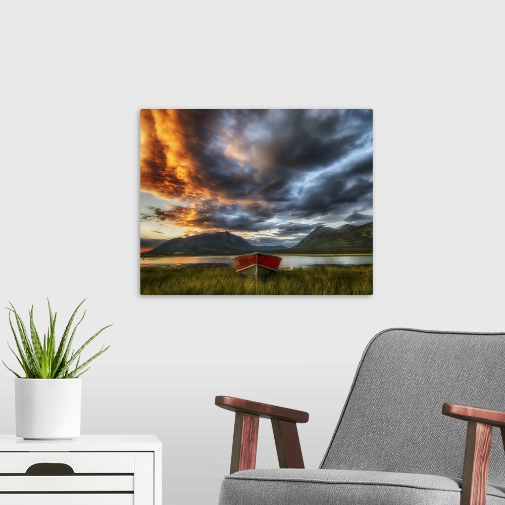 A modern room featuring Small boat with moody sky, Carcross, Yukon, Canada.
