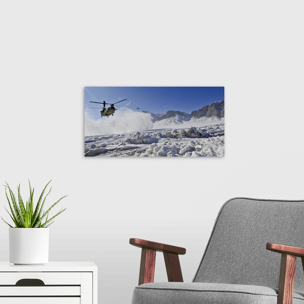 A modern room featuring February 8, 2012 - Snow flies up as a U.S. Army CH-47 Chinook helicopter lands at a remote landin...