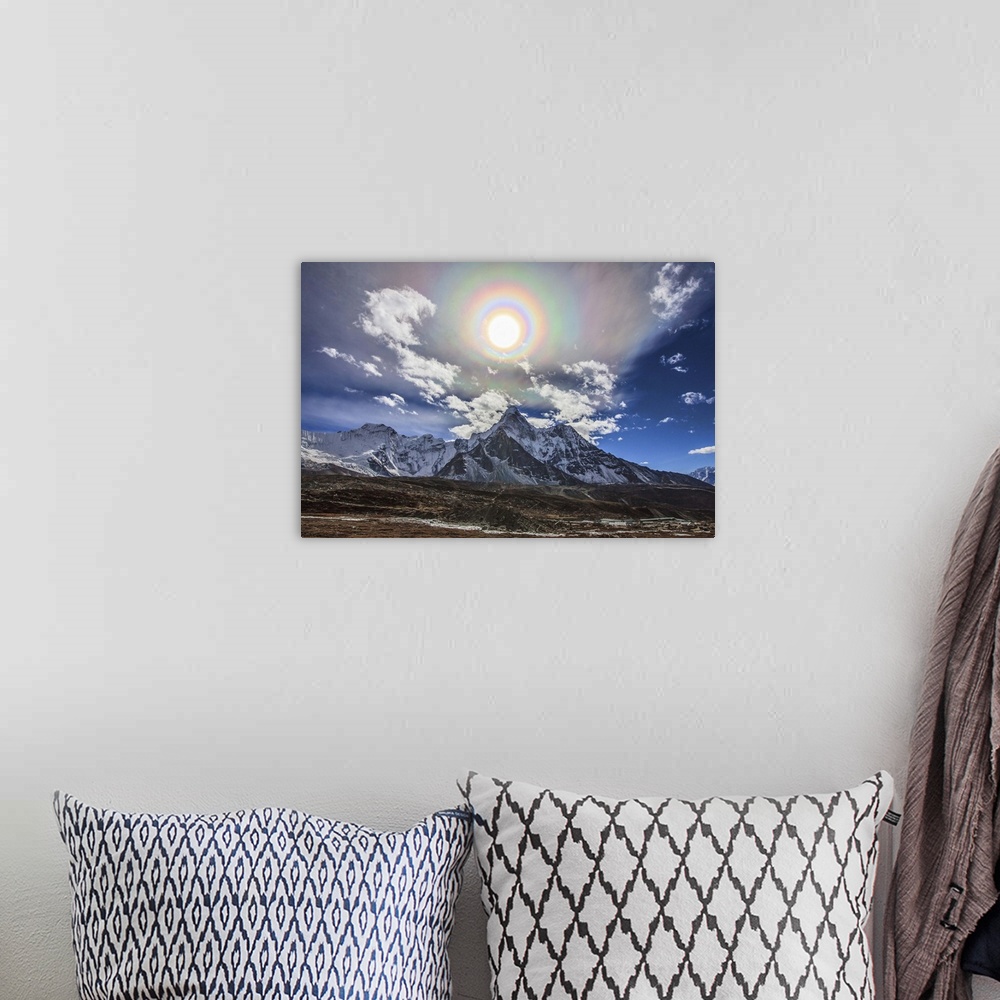 A bohemian room featuring Colorful solar corona over the Himalayas. In the foreground is the famous Himalayan mountain peak...