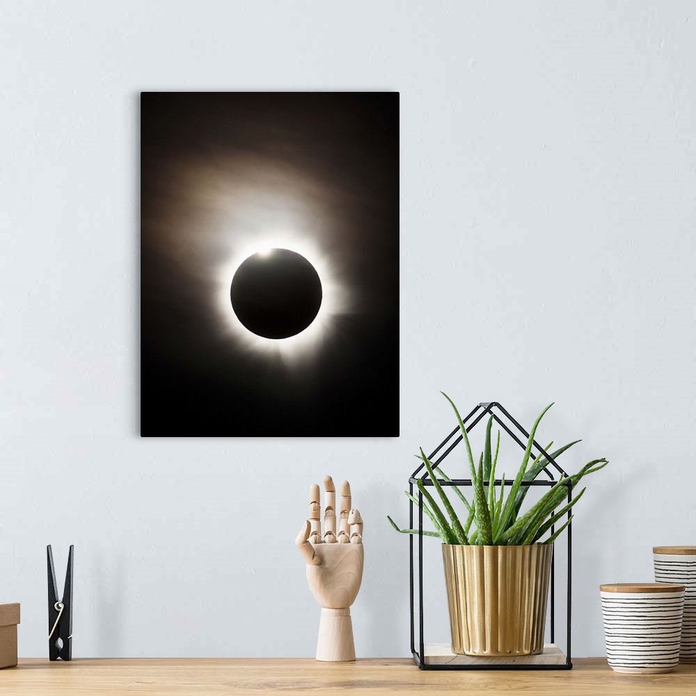 A bohemian room featuring Solar Eclipse with diamond ring effect, Queensland, Australia.