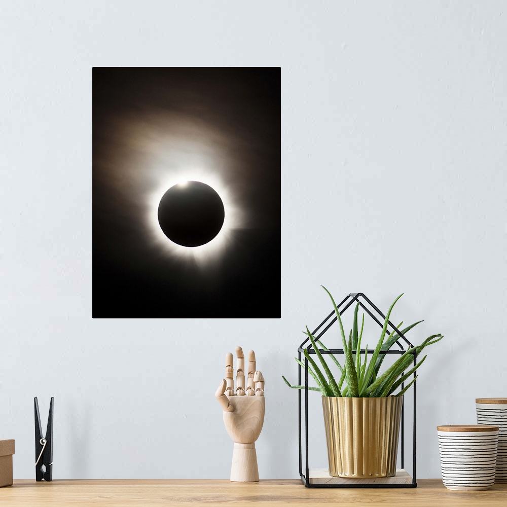 A bohemian room featuring Solar Eclipse with diamond ring effect, Queensland, Australia.