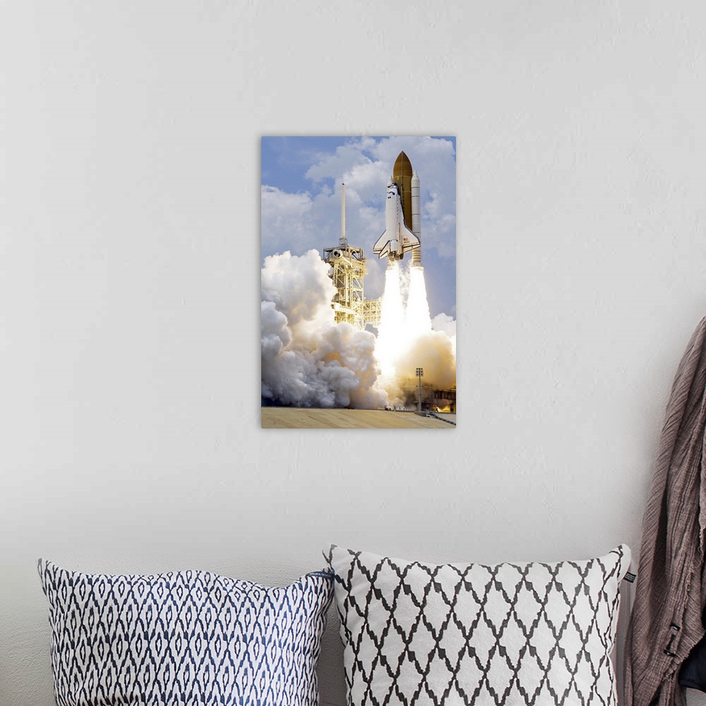 A bohemian room featuring Space Shuttle Atlantis lifts off from its launch pad