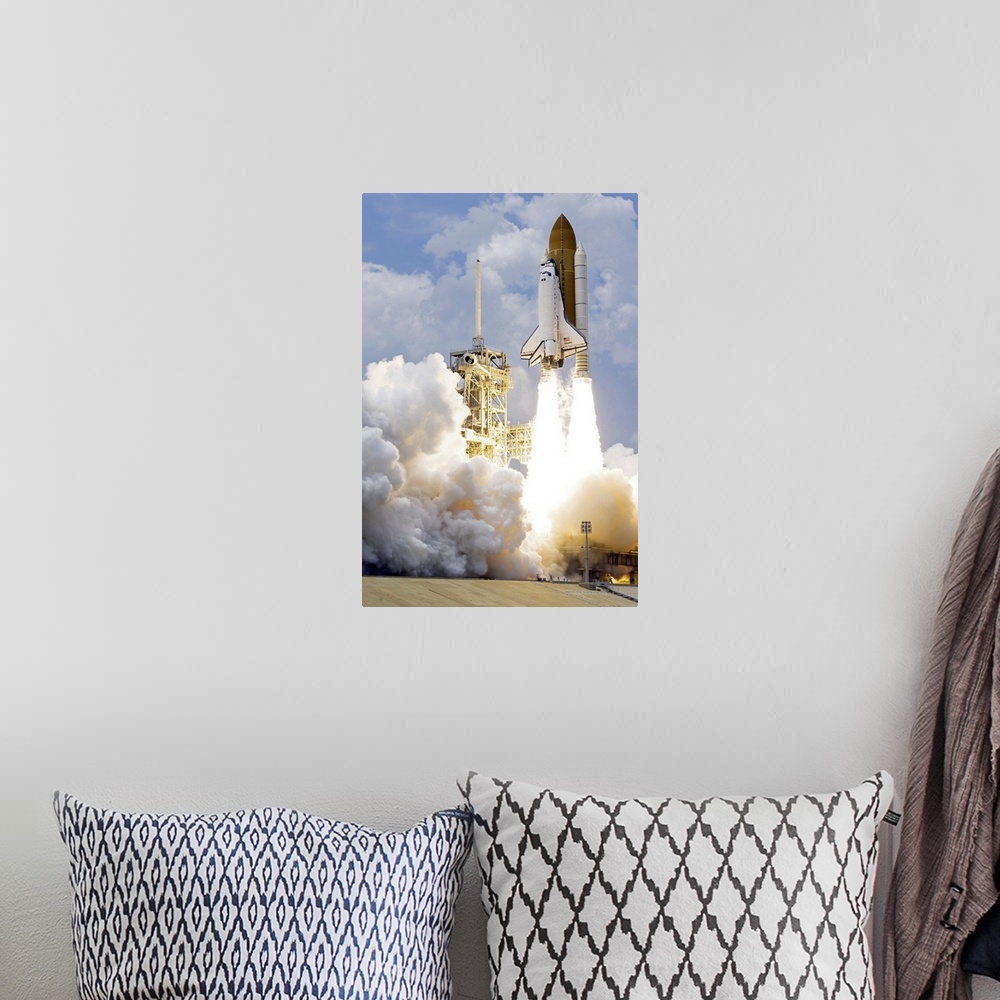 A bohemian room featuring Space Shuttle Atlantis lifts off from its launch pad