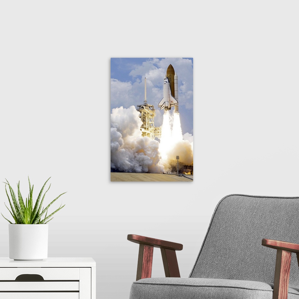 A modern room featuring Space Shuttle Atlantis lifts off from its launch pad