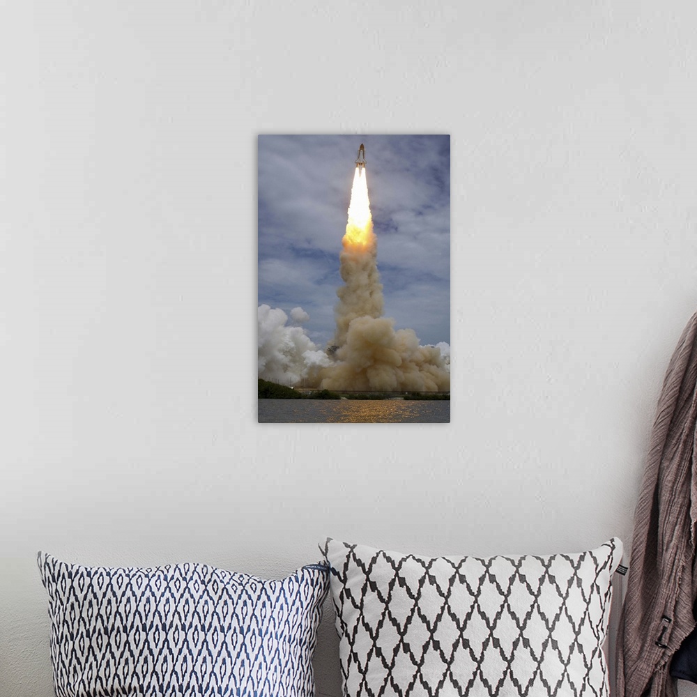 A bohemian room featuring July 8, 2011 - Space shuttle Atlantis is seen as it launches from pad 39A at the Kennedy Space Ce...